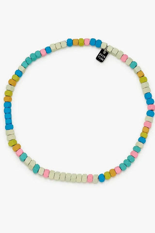 Colorful beaded necklace on a white background