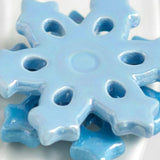 Blue snowflake-shaped object on a white background