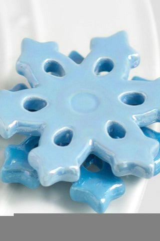 Blue snowflake-shaped object on a white background