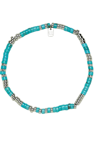 Turquoise beaded necklace with silver accents on a white background
