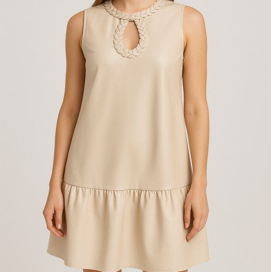Beige dress with lace neckline on a plain background