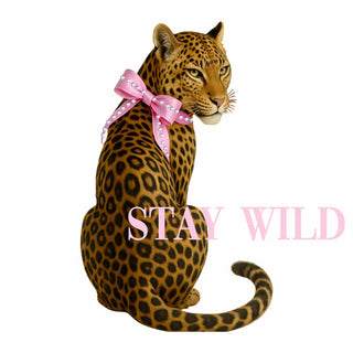 Leopard with a pink bow and 'Stay Wild' text on a white background