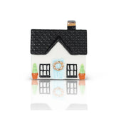 House-shaped container with a black roof and white body on a white background
