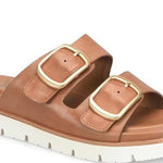 Brown sandal with gold buckles on a white background
