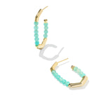 Turquoise beaded hoop earrings with gold accents on a white background