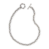 Silver chain bracelet on a white background