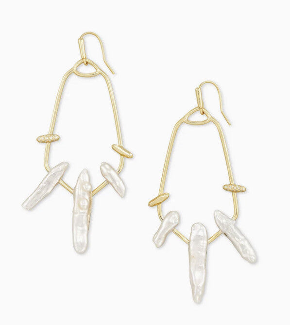 Gold hoop earrings with pearl-like beads on a white background