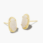 Iridescent drusy stone with gold earrings.