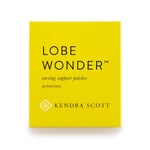 Yellow box of Lobe Wonder earring support patches by Kendra Scott on a white background