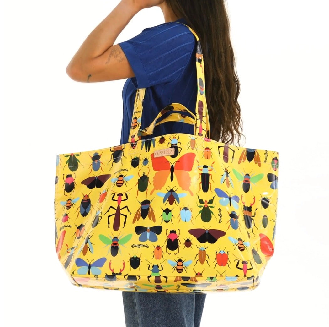 LARGE VINYL BAG on female shoulder