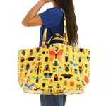 LARGE VINYL BAG on female shoulder