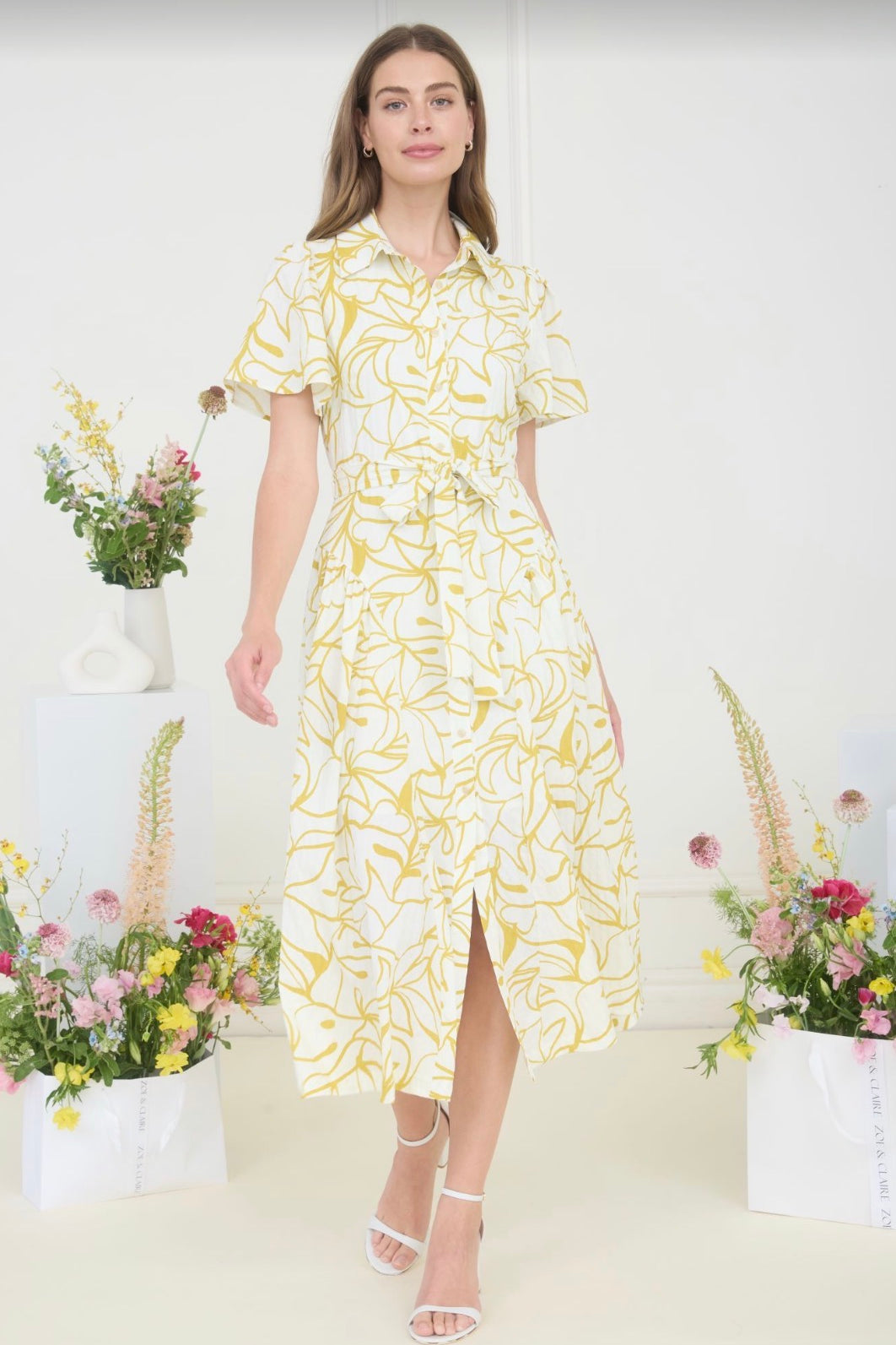 WHITE and yellow dress on model 