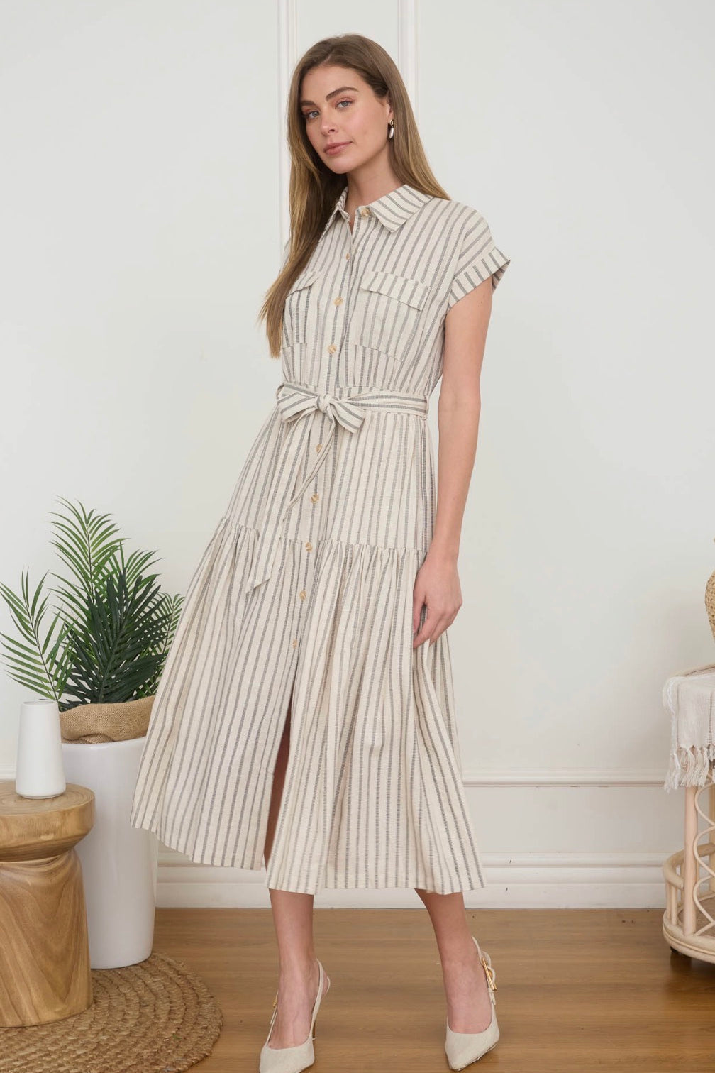 Striped dress with belt on model