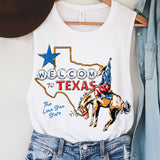 White tank top with 'Welcome to Texas' graphic, cowboy hat, and denim jacket on a hanger.
