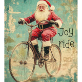 Vintage-style Christmas art print featuring Santa Claus riding a bicycle with the words 'Joy ride.' on a distressed teal and cream background.