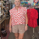 red polka dot shirt