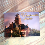wooden postcard with waxahachie texas courthouse on it.