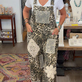 Woman wearing a patterned jumpsuit in a store setting