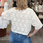 Woman in a store looking at merchandise