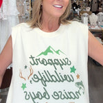 Woman wearing a white tank top with text in a store setting