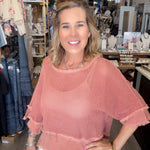 model in mesh gauze top in rust color a