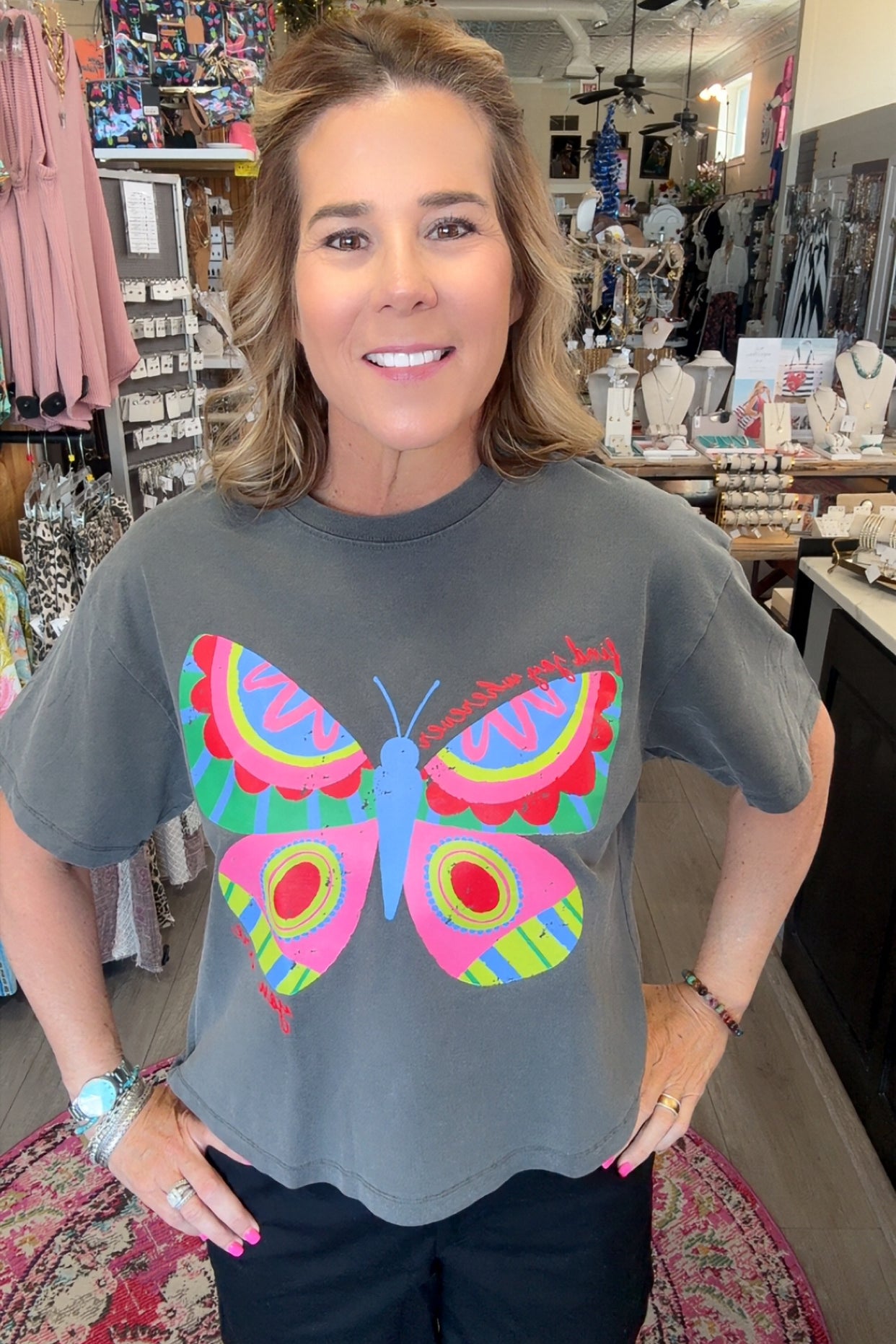 GREY TSHIRT ON MODEL WITH WRITING
