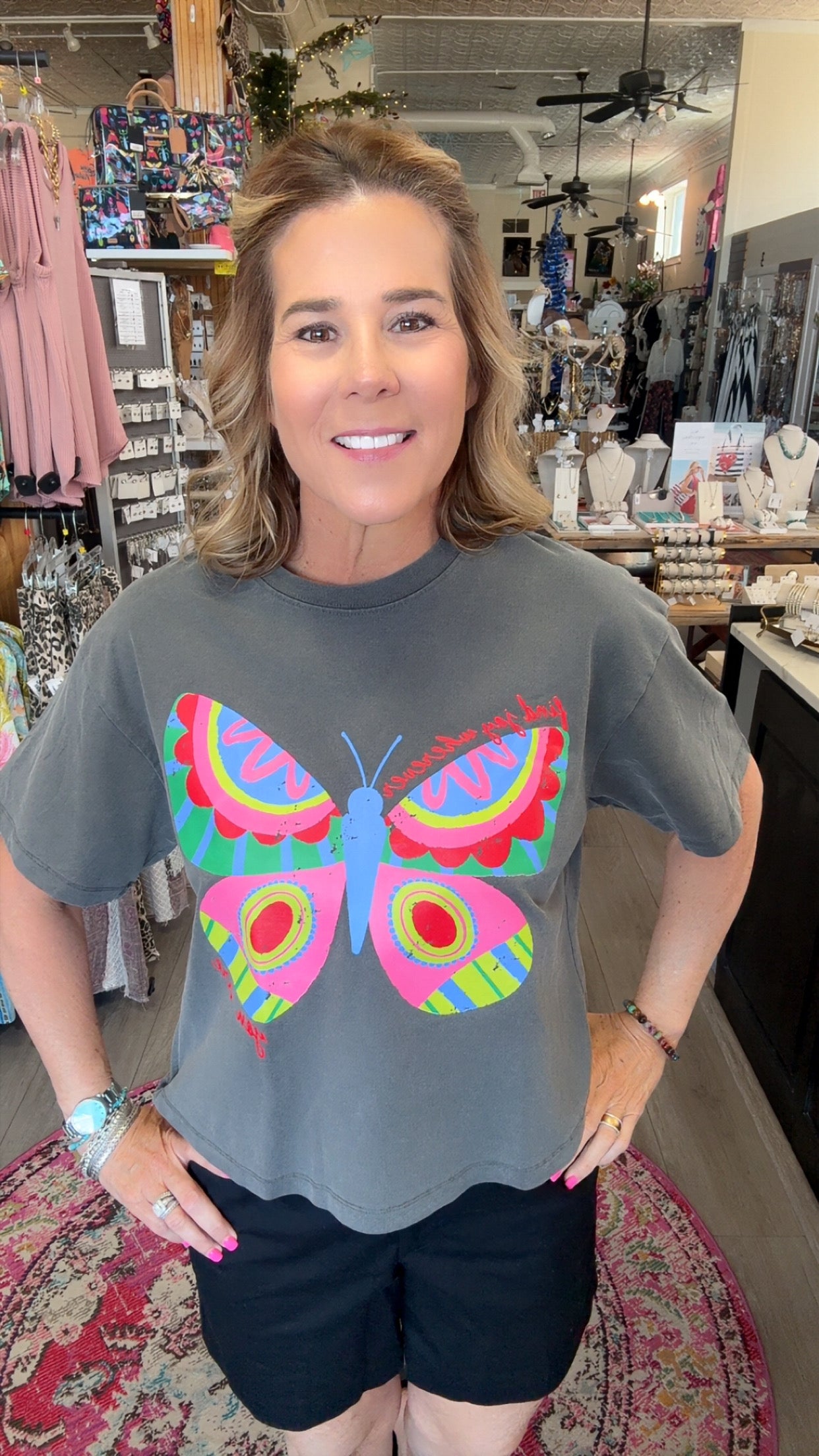 GREY TSHIRT ON MODEL WITH WRITING
