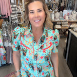 MODEL IN TURQUOISE PEARL SNAP TOP 