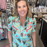 MODEL IN TURQUOISE PEARL SNAP TOP 
