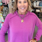 MODEL IN PINK LONG SLEEVE TOP
