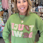 MODEL IN GREEN SWEATSHIRT SAYING TOUCH DOWN
