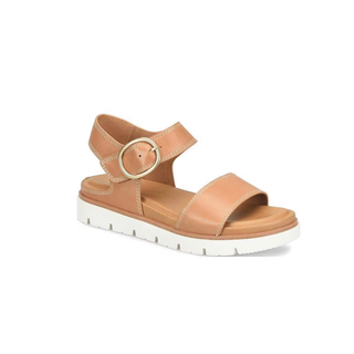 Tan sandal with a gold buckle on a white background