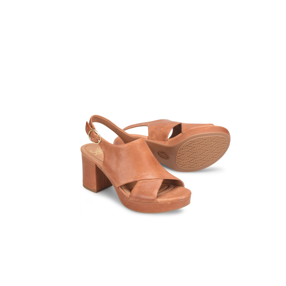 Pair of brown sandals on a white background