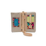 Multicolored wallet with floral patterns and a strap on a white background