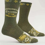 A pair of green socks with text and floral patterns on the ankle area, displayed in a standing position.