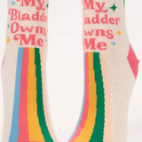 Pair of socks with colorful rainbow design and text on a white background