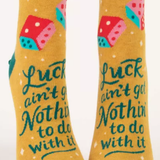 Pair of socks with colorful designs and text on a white background