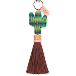 Cactus-shaped keychain with a broom on a white background