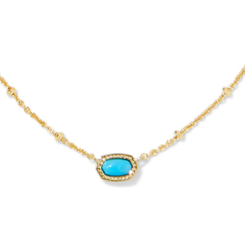 Gold necklace with a turquoise stone on a white background