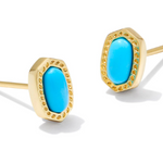 Gold earrings with turquoise stones on a white background