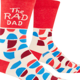 Colorful socks with geometric pattern and 'The RAD DAD' text on a white background