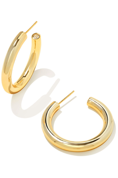 Gold hoop earrings on a white background