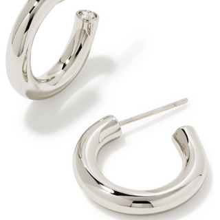 Silver hoop earrings on a white background