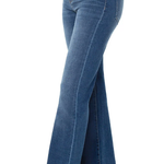 A pair of mid-rise bootcut jeans in a Yuba wash with a slim fit through the hips and thighs, featuring a bootcut style at the knee and leg opening. The jeans have a 5-pocket design, a set-in waistband with belt loops, and a single logo button closure.