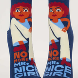 Pair of socks with a design of a person with red hair and text 'No More Mr. Nice Girl' on a white background.