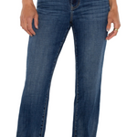 Blue jeans worn by a person on a white background