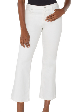 A pair of white flare jeans with a mid-rise waist and classic 5-pocket styling.