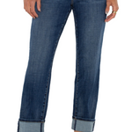 Blue jeans worn by a person on a white background