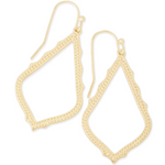 Gold hoop earrings on a white background