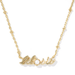Gold necklace with 'alitosis' pendant on a white background